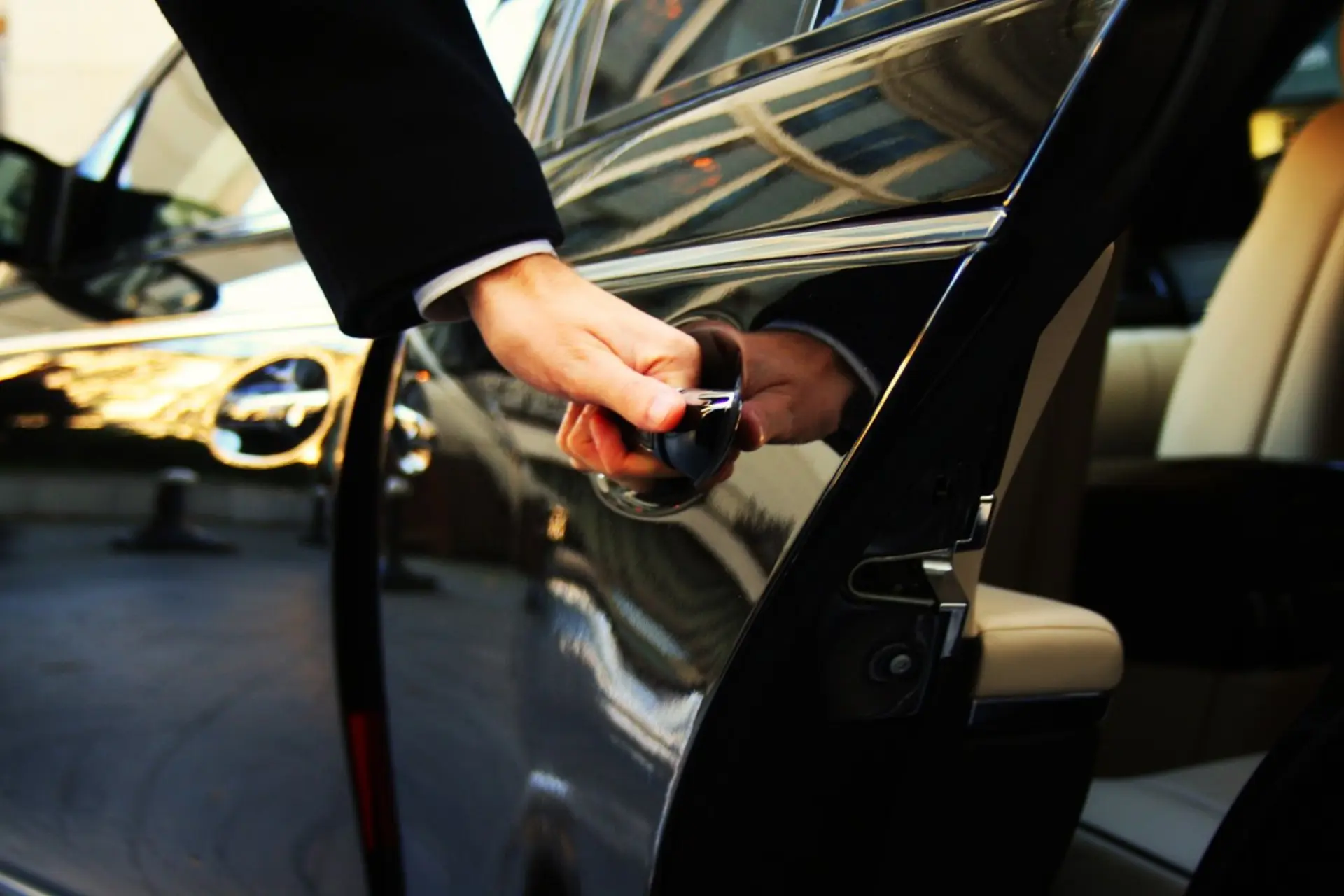 Pome opening the Cadillac Escalade door — Nashville Limo Ride BNA airport transfers